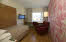 Single room with red floor